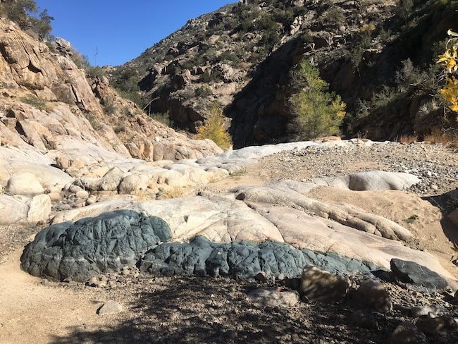 Interesting geology of light and dark contrasting bedrock in Poland Creek